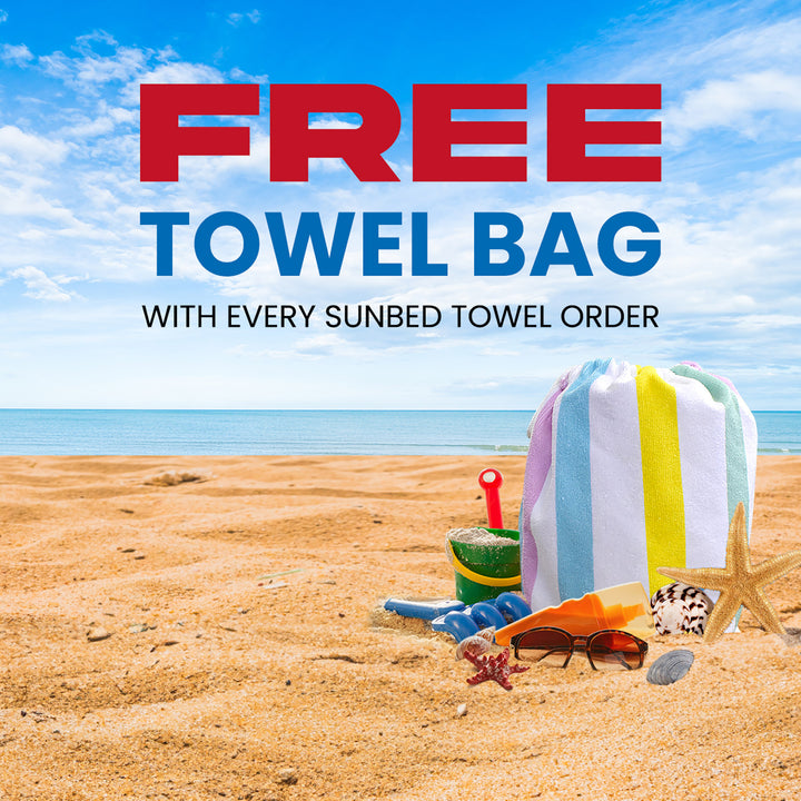 a towel and a hat on a beach with the words free towel bag with every